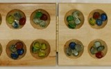 Wooden_mancala_board